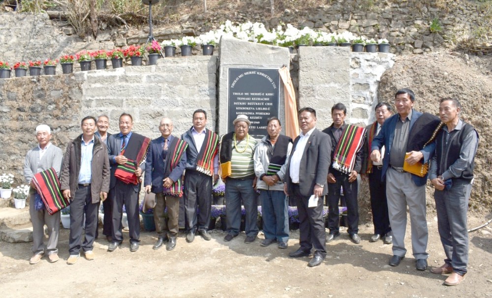 MLA Keneizhakho with elders and officials during the inauguration of monolith to commemorate the friendship between the Tholo clan of Jotsoma and the Merhü clan of Khonoma inaugurated at Tholoma Tsiepfhe, Jotsoma on February 23. (DIPR Photo)